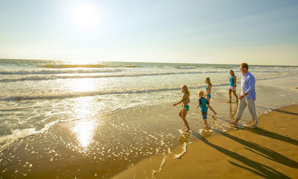 Virginia Beach events, a family enjoying the beach view, 3 girls a boy with dad. 